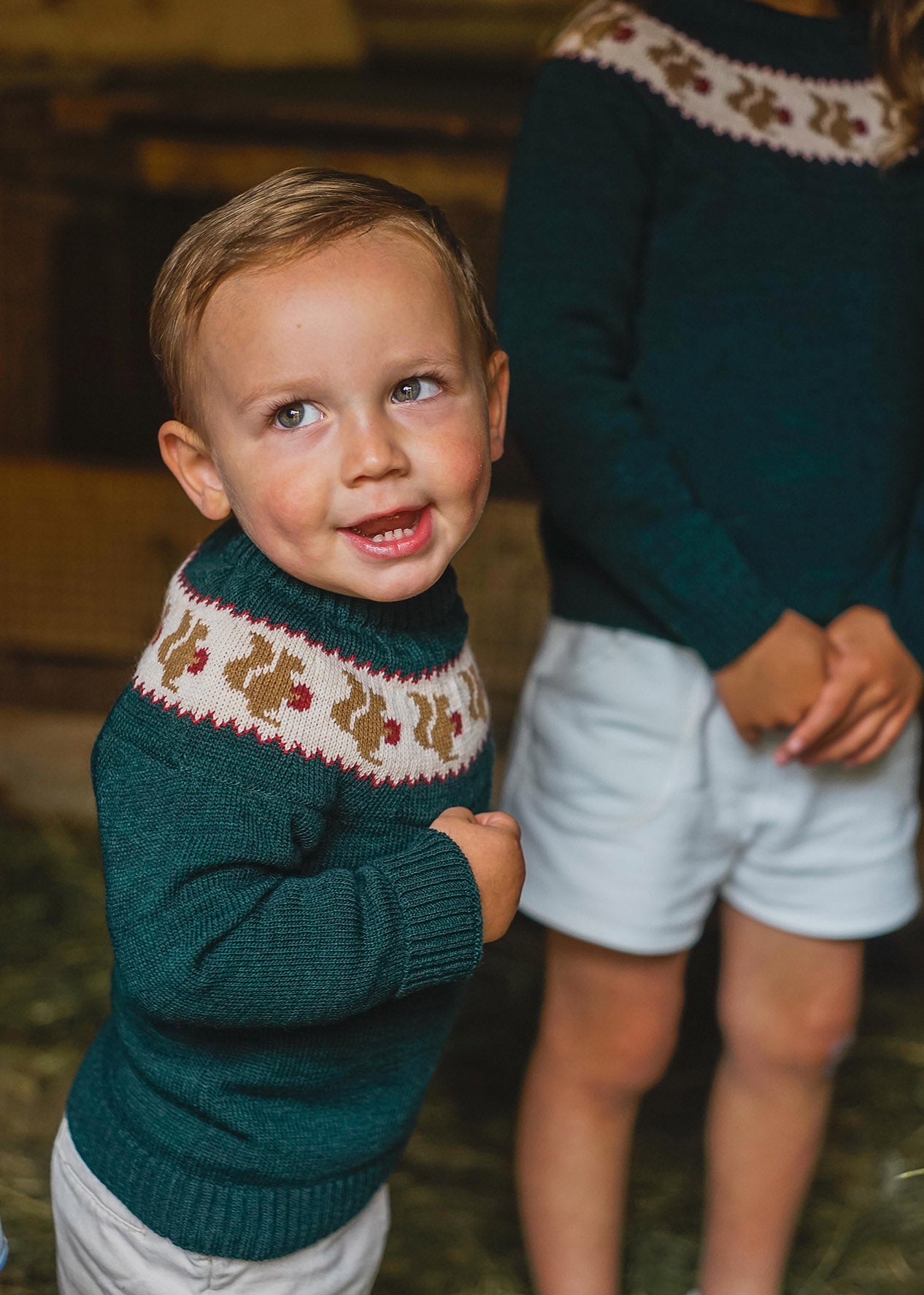 Navy blue sweater with light blue fret