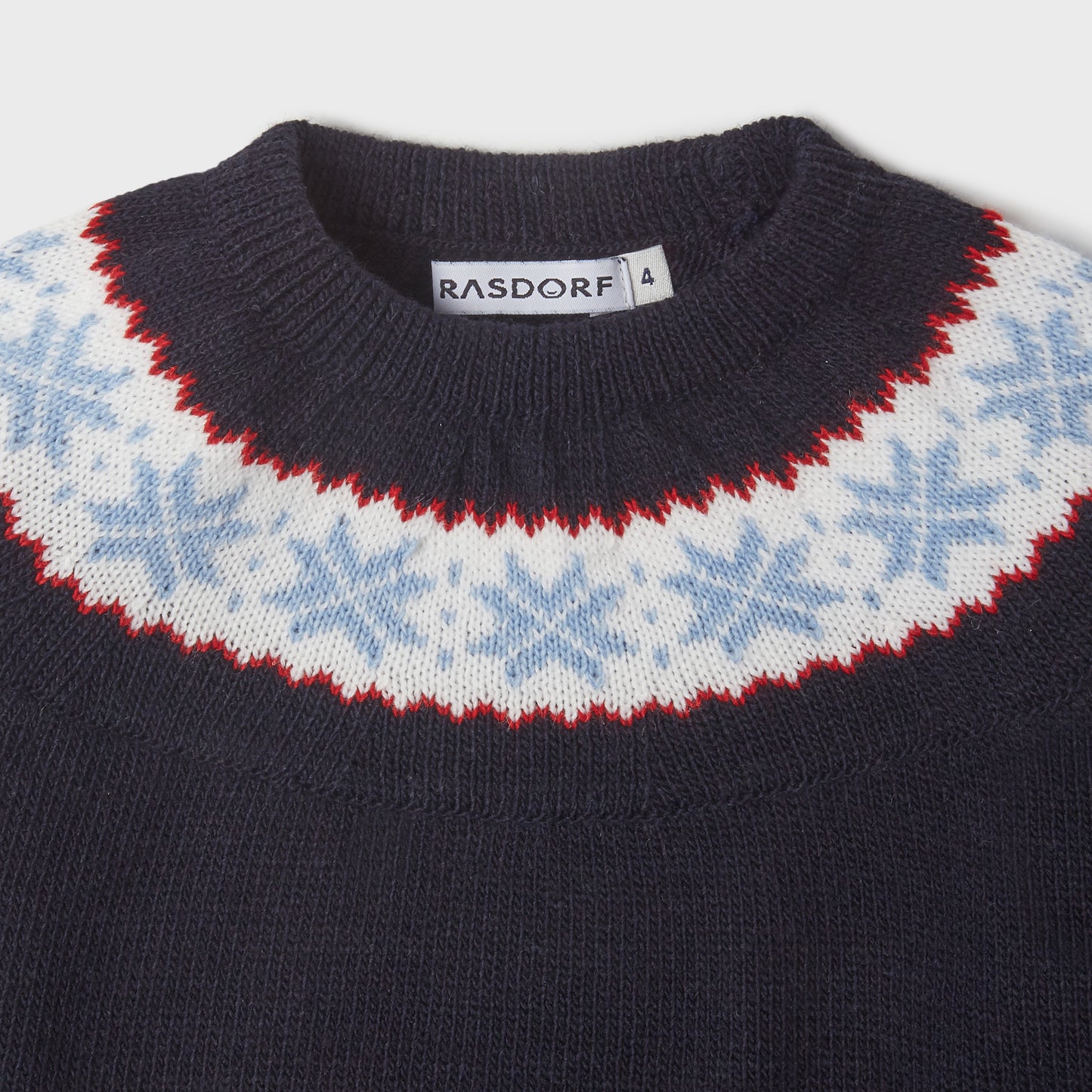 Navy blue sweater with light blue fret